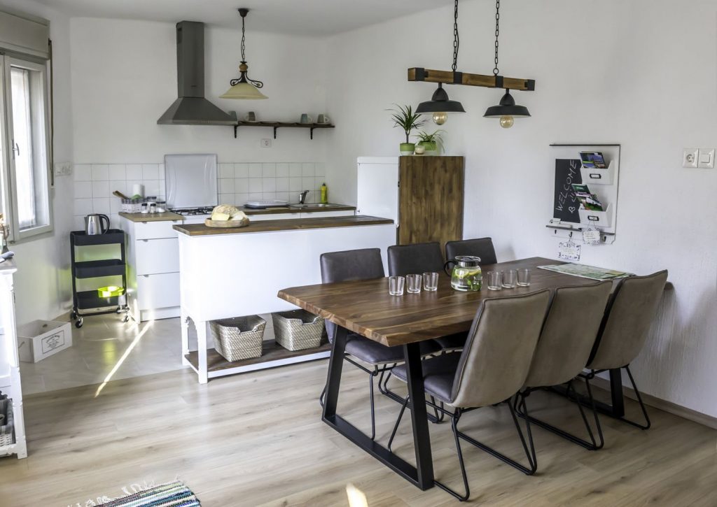 A table for 6 in a living room in Bovec Summer House appartment.